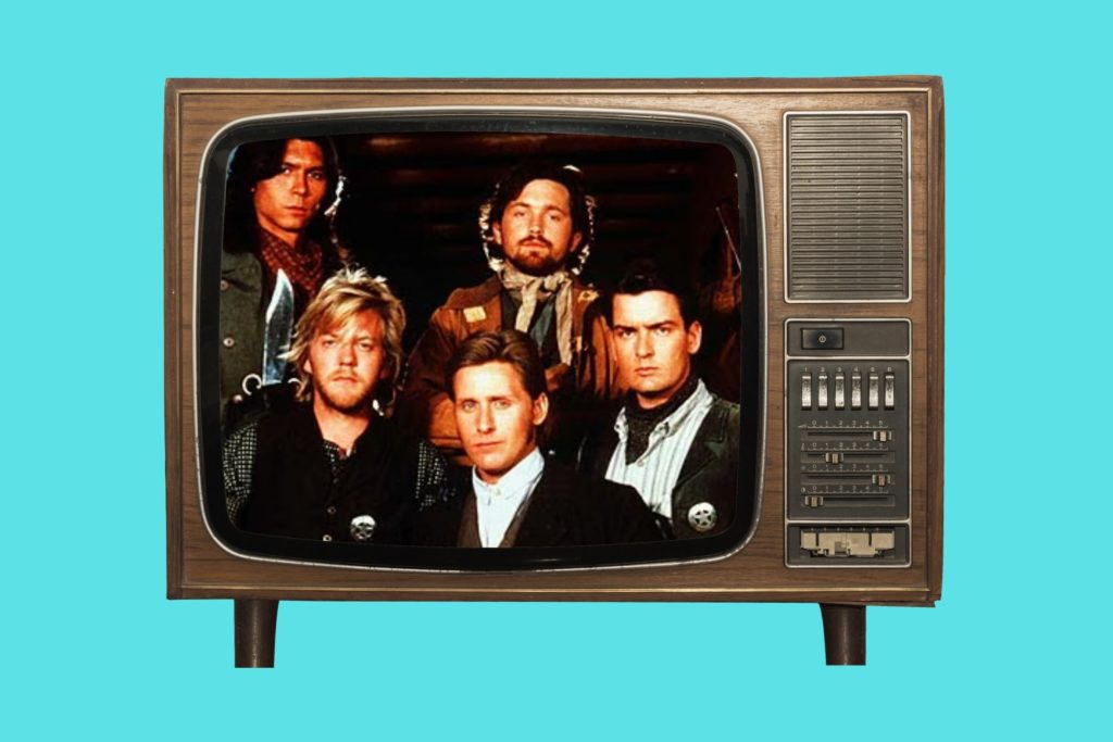 1980s Brat Pack movie posters in cinema room The Breakfast Club detention scene St Elmo’s Fire cast group image Molly Ringwald in Pretty in Pink Andrew McCarthy Brats documentary still John Hughes directing 1980s teen movie classic Brat Pack actors together 1980s teen cinema VHS collection